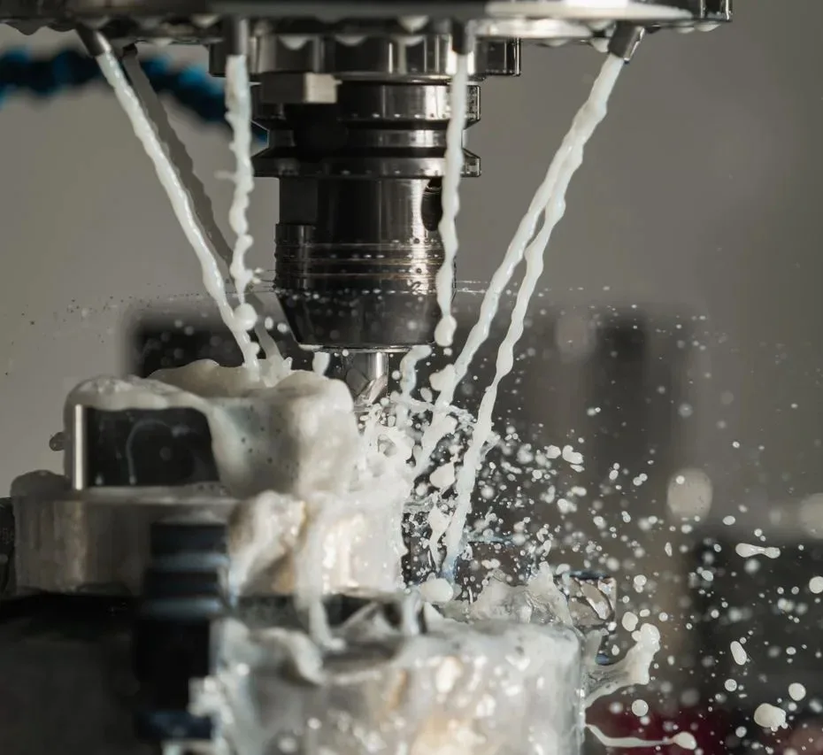 Precision manufacturing process using specialty cleaning solvents on machined metal components